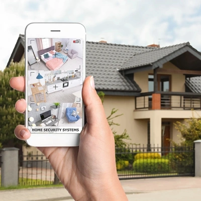 Greensboro vivint phone display of cctv live feed in front of a house